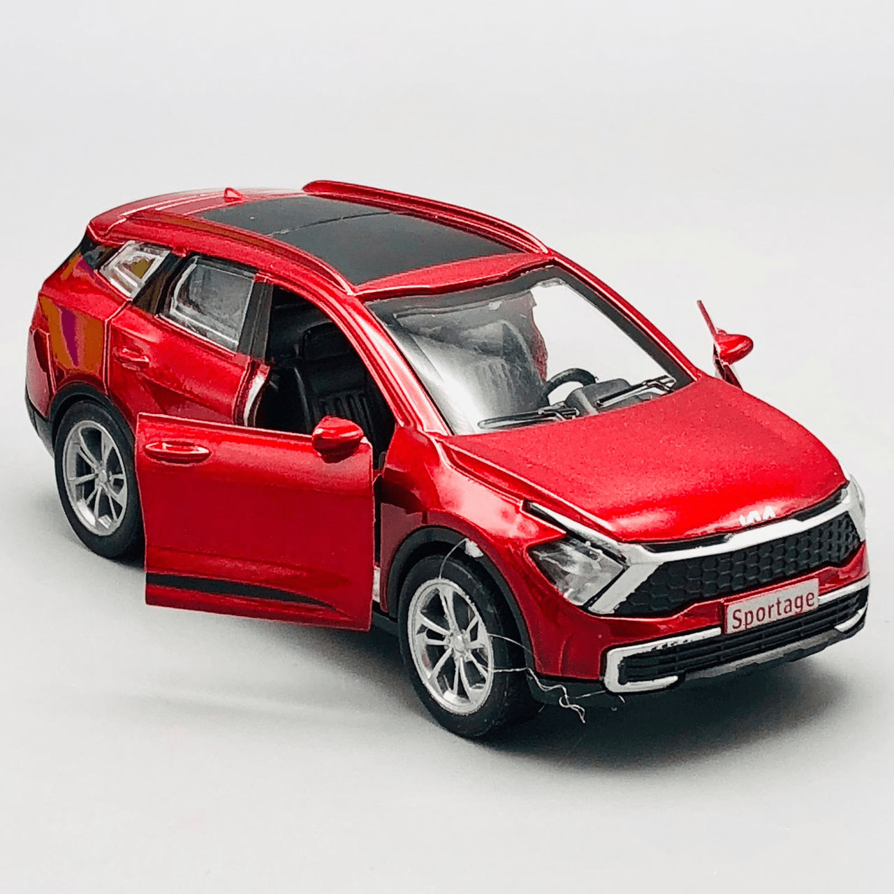 mini-diecast-kia-sportage-motor-car kids toy in Pakistan | Zilonay