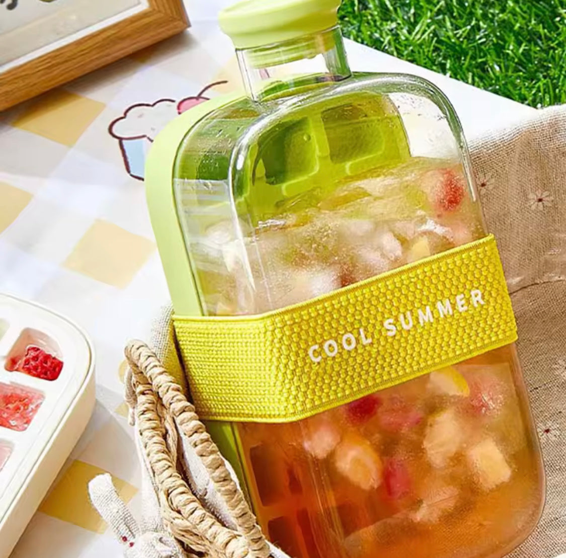 Ice maker bottle with carrying handle for gym and outdoor activities